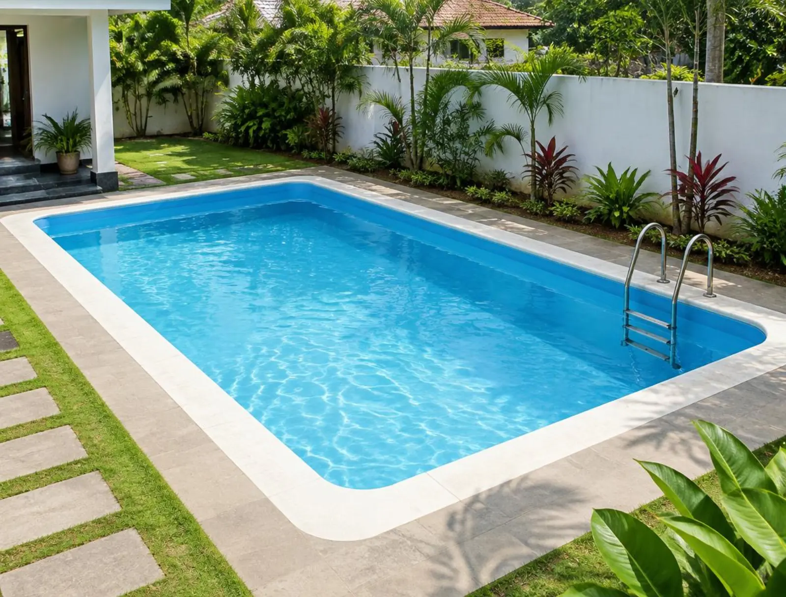 AI-generated illustration of an in-ground vinyl liner pool with a smooth blue lining, steps and stone coping beside a family home in India